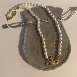 Gold Vivienne Westwood Pearl Necklace.